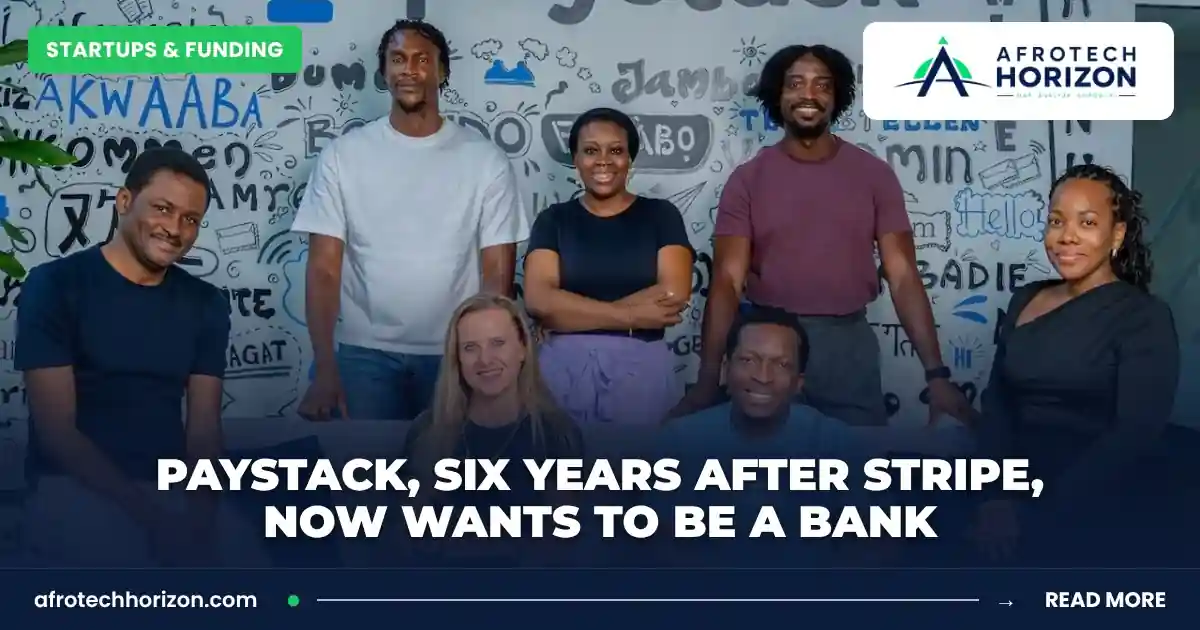 Members of Paystack's senior leadership team posing together in front of a wall covered with greetings in many languages.